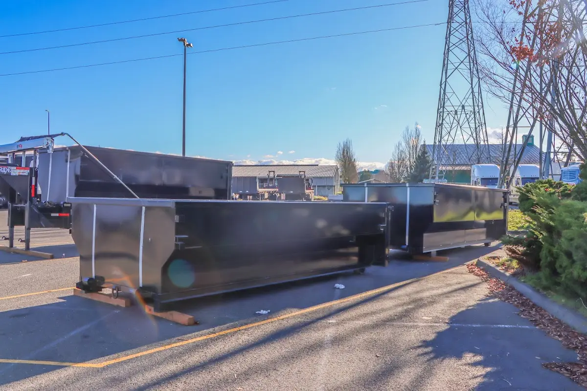 Roll-off dumpster ready for waste disposal at job site for Construction Dumpster Rental in Madison Heights